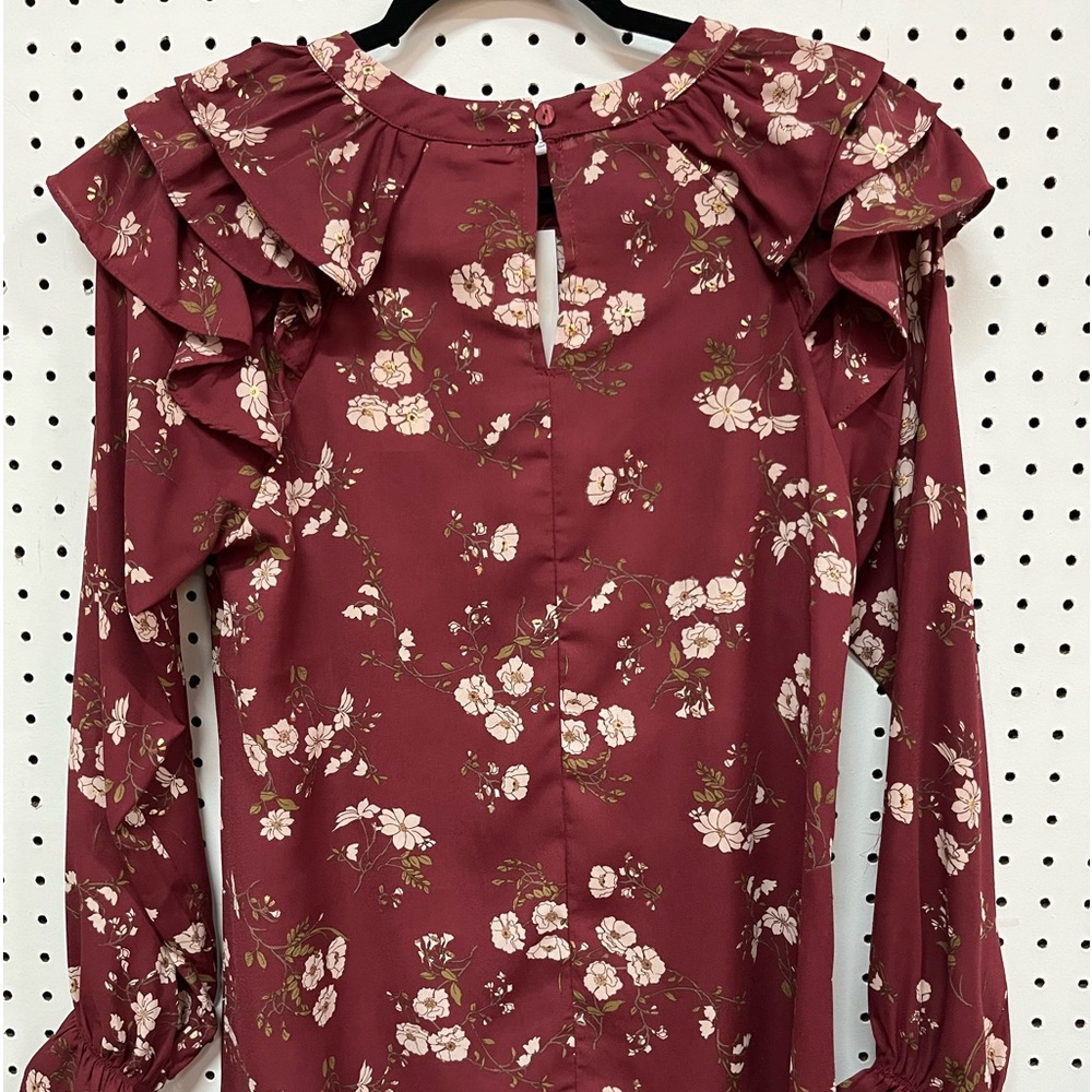Doe & Rae pull/over back neck button.100% polyester hand wash cold hang to dry.